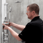 professional-installing-newly-remodeled-shower