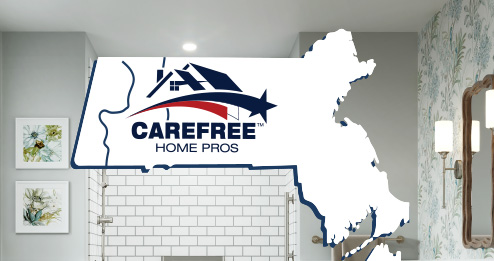 a bathroom with a map of the state of maine on the wall