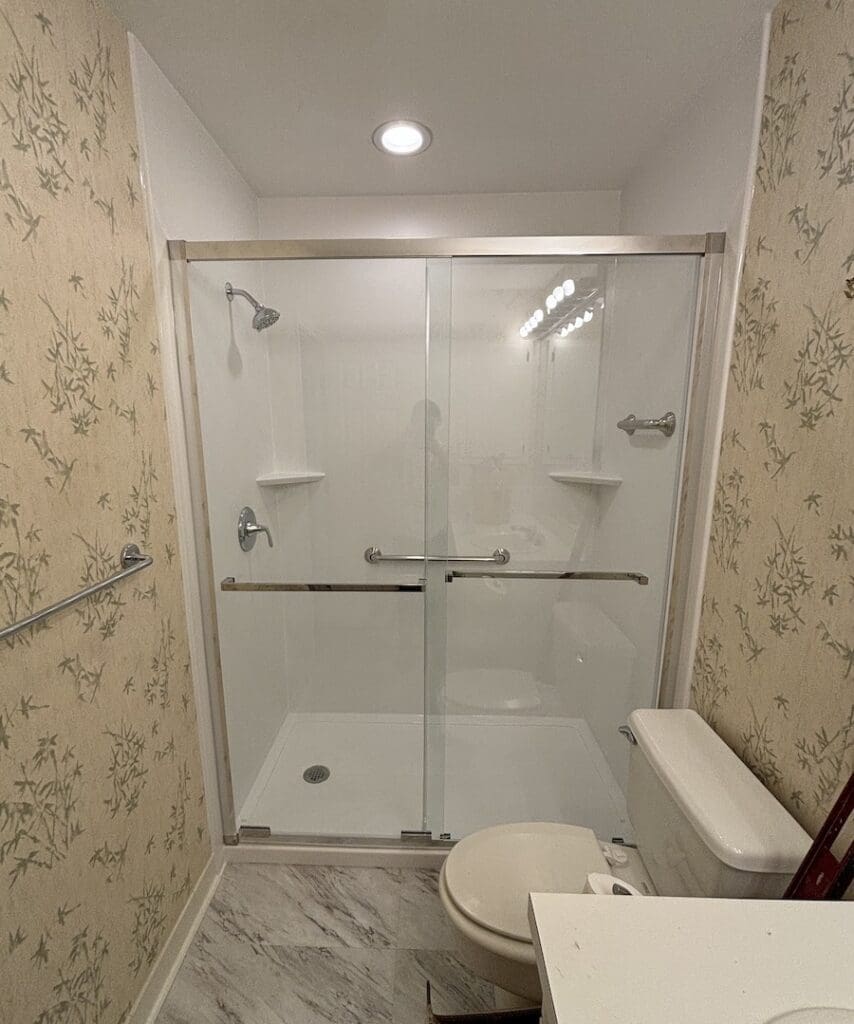 Walk-in shower with recessed lighting