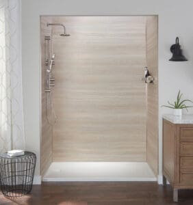 a bathroom with a walk-in shower next to a sink