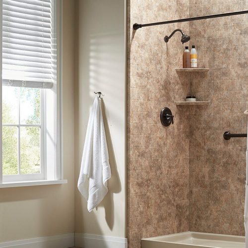 Modern and clean bathroom in West Hartford with sleek fixtures and tasteful decor.